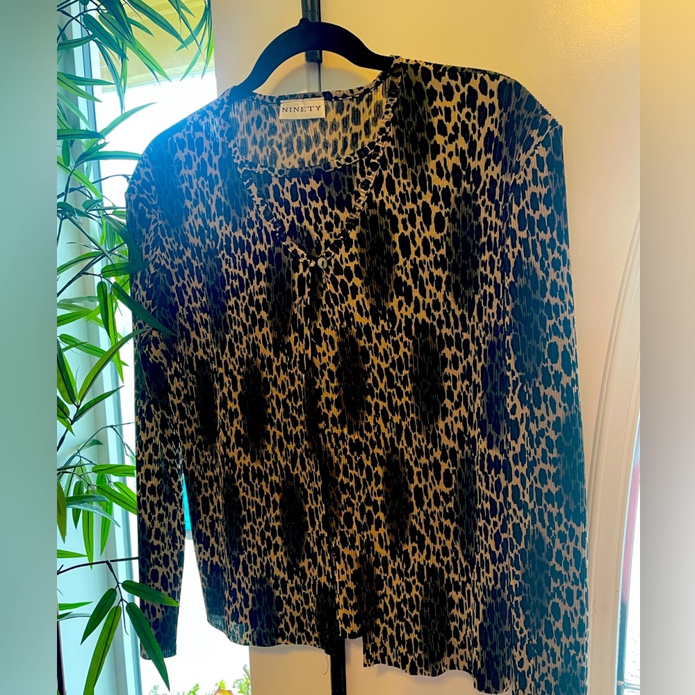 Leopard print faux twin set.